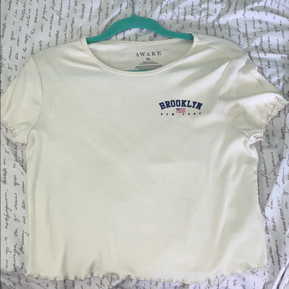 A pastel yellow cropped Top